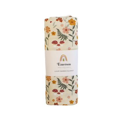 packed cream blanket with emerson and friends packaging. 