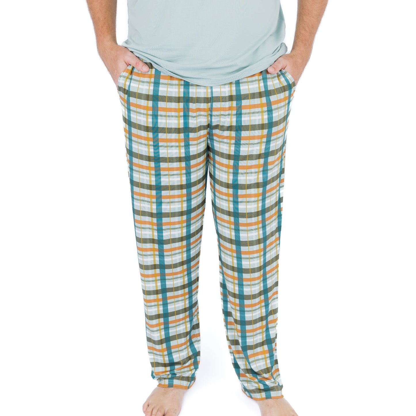 man wearing relaxed pajama pants with plaid print
