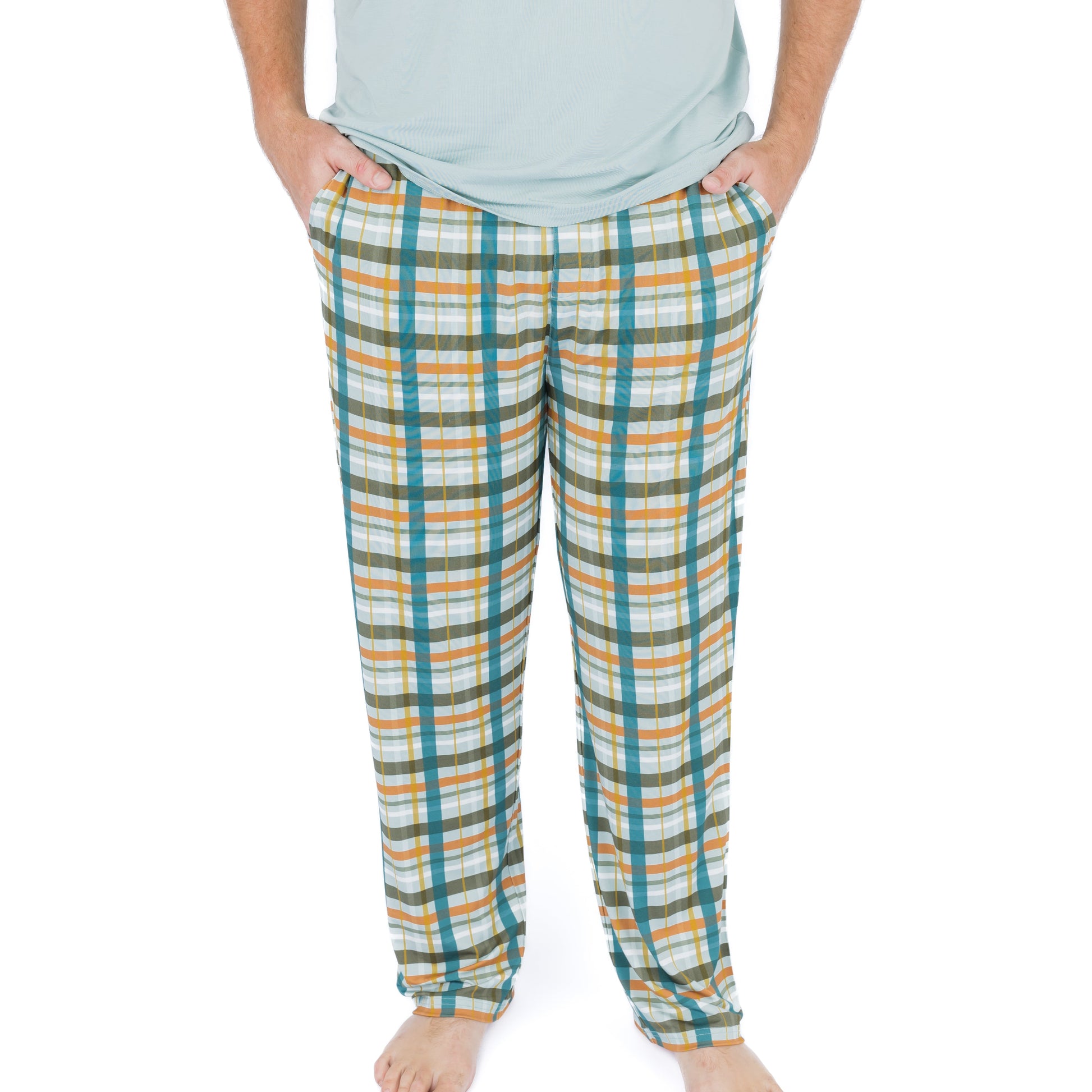 man wearing relaxed pajama pants with plaid print