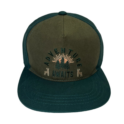 green hat with words in the middle.
