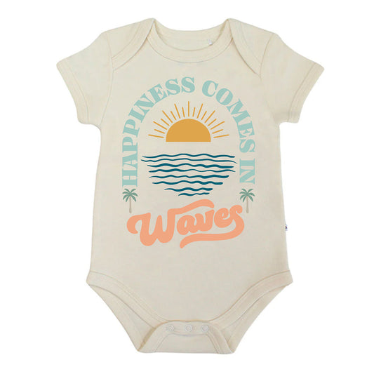 Beige baby onesie with 'Happiness Comes in Waves' text and graphics on a white background