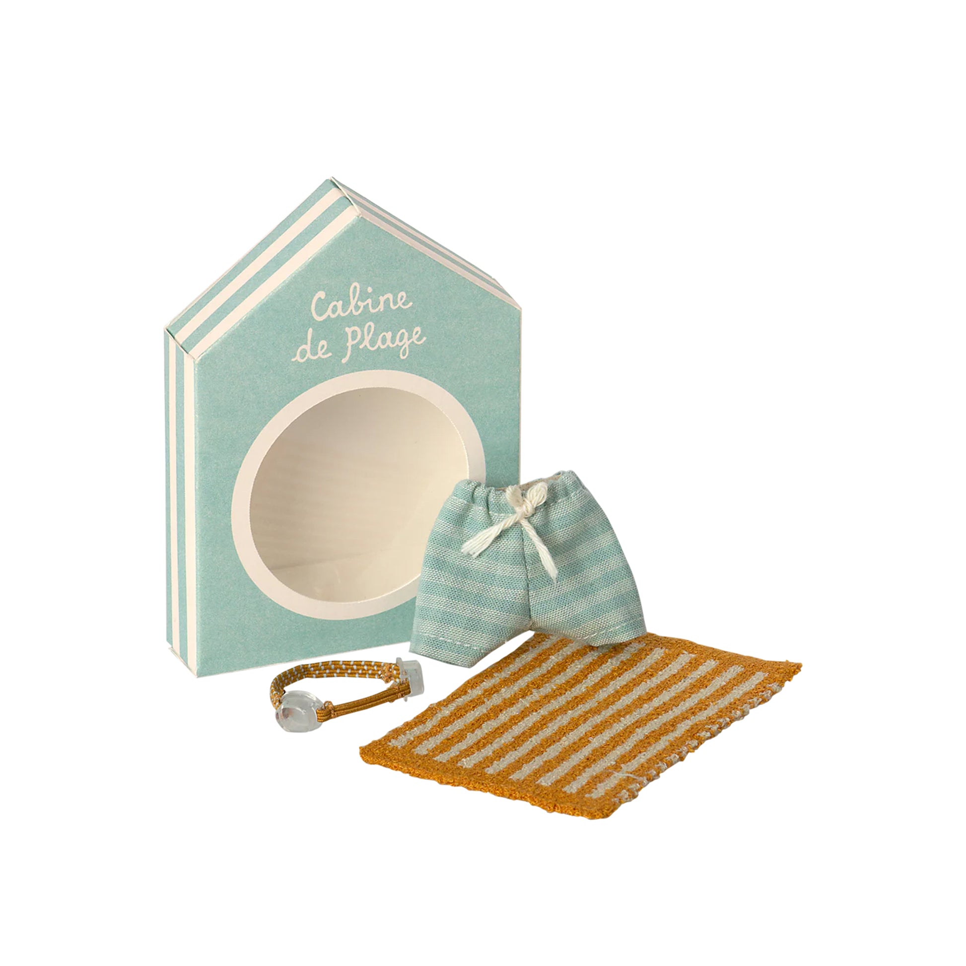 Set with a beach hut, striped shorts, and a bracelet on a white background
