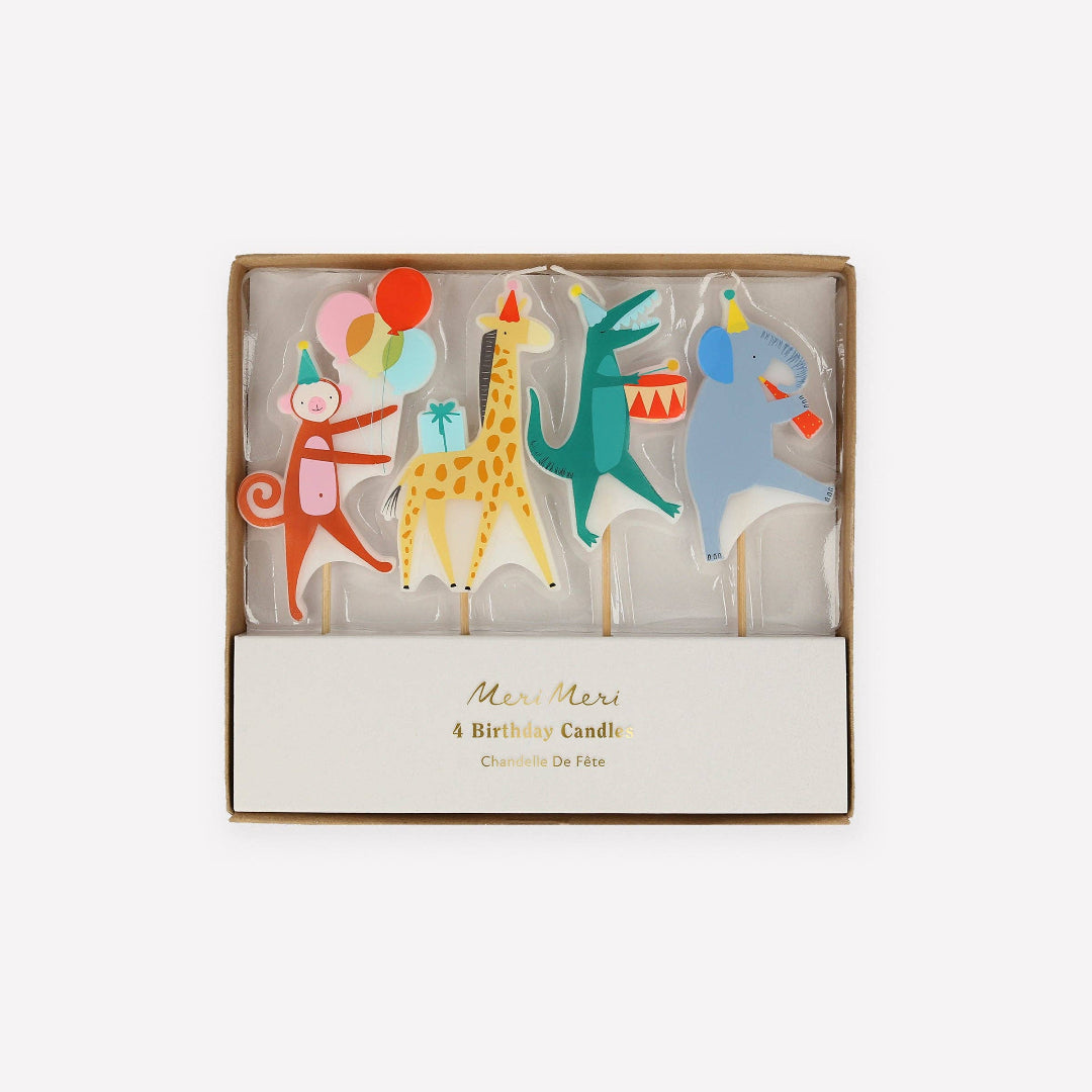 Set of colorful animal-themed birthday candles in a box