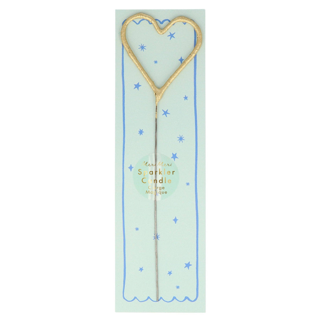 Heart-shaped sparkler on a light green card with blue stars