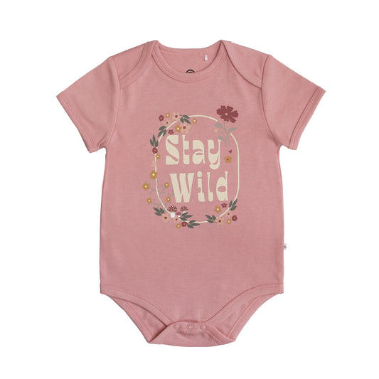 pink onesie with words on front.