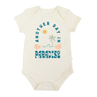 Baby bodysuit with 'Another Day in Paradise' text and graphics on a white background