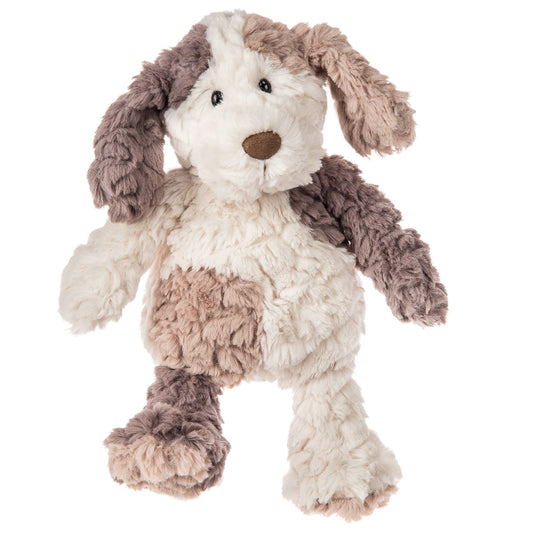 stuffed dog thats cream and brown