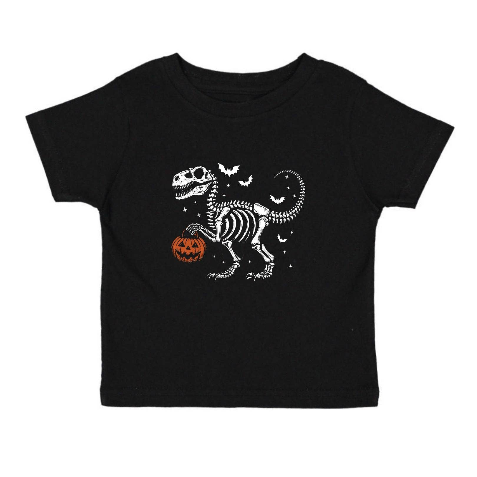 A black short-sleeve baby t-shirt featuring a white dinosaur skeleton graphic holding an orange jack-o'-lantern pumpkin, with small bats and stars.