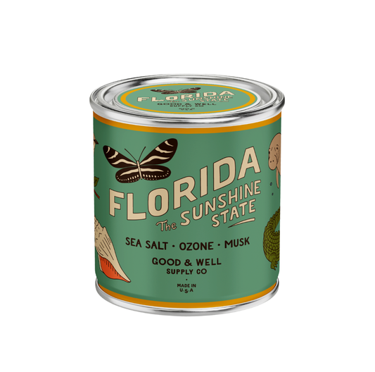 Canister with 'Florida Sunshine State' label featuring nature-themed illustrations on a white background