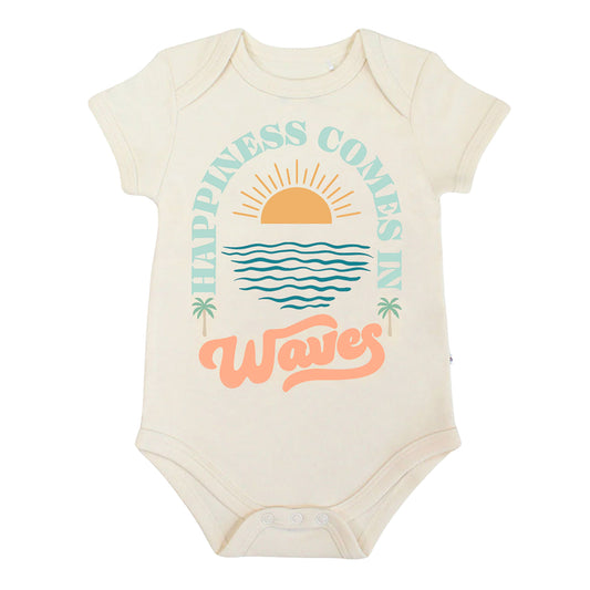 Beige baby bodysuit with 'Happiness Comes in Waves' design on a white background