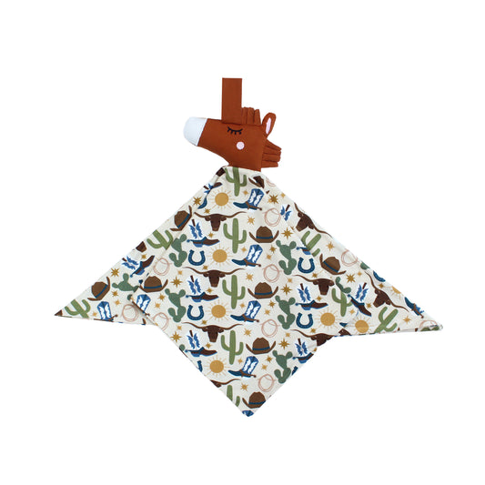 Our lovey featuring a charming cowboy-themed print with blue boots, cacti, suns, horseshoes, and cowboy hats. The perfect blend to pair with our bamboo pajamas. 