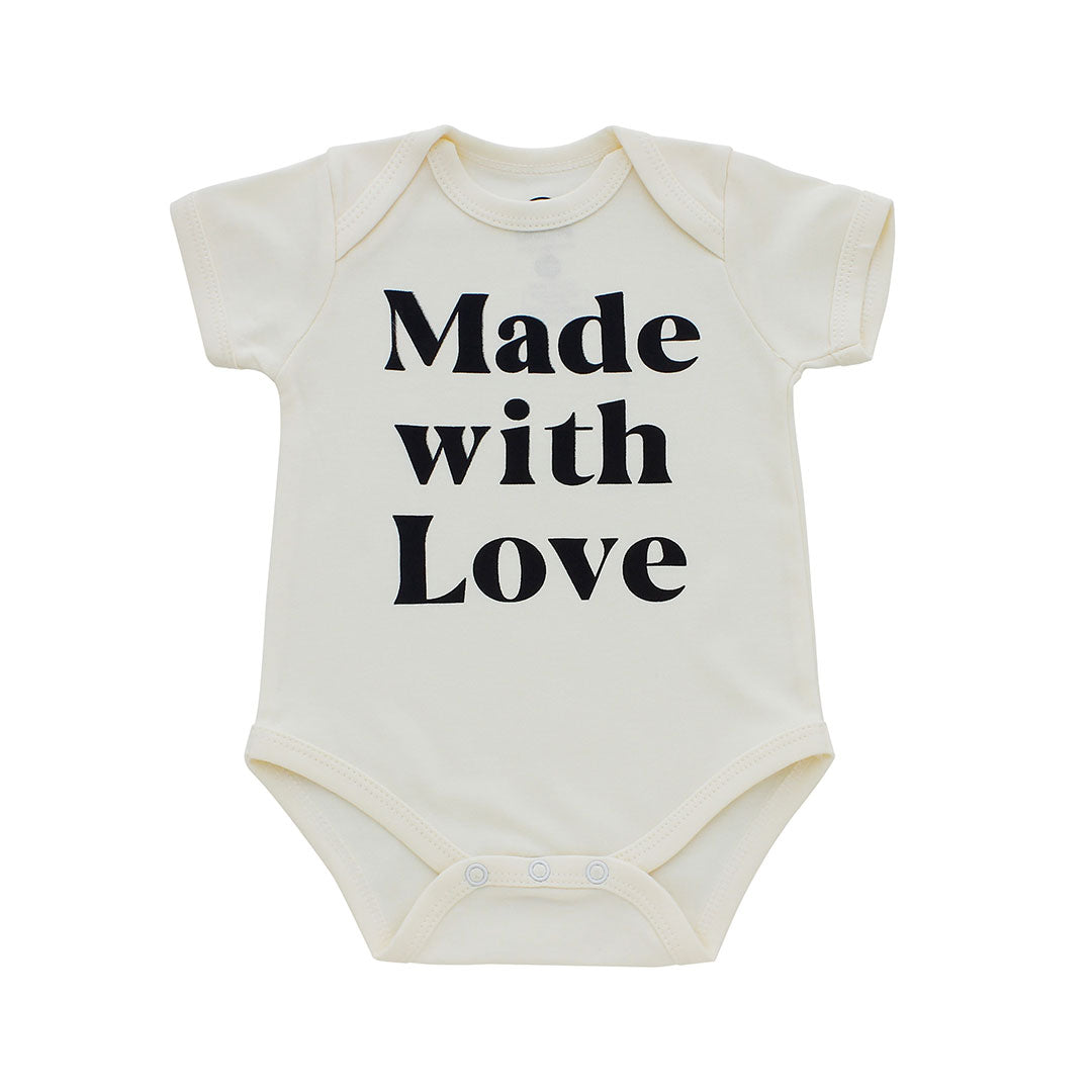 Baby bodysuit with 'Made with Love' text on a white background