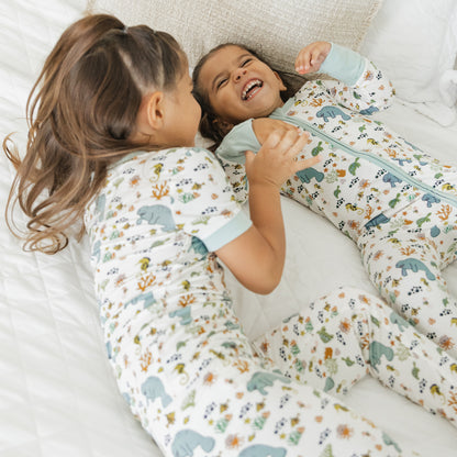 Close up of kids manatee bamboo pajama set showing soft fabric and ocean print design
