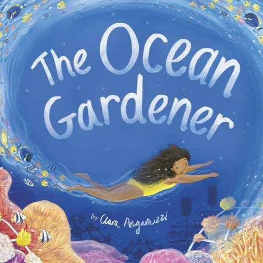 book with a girl swimming near a coral reef