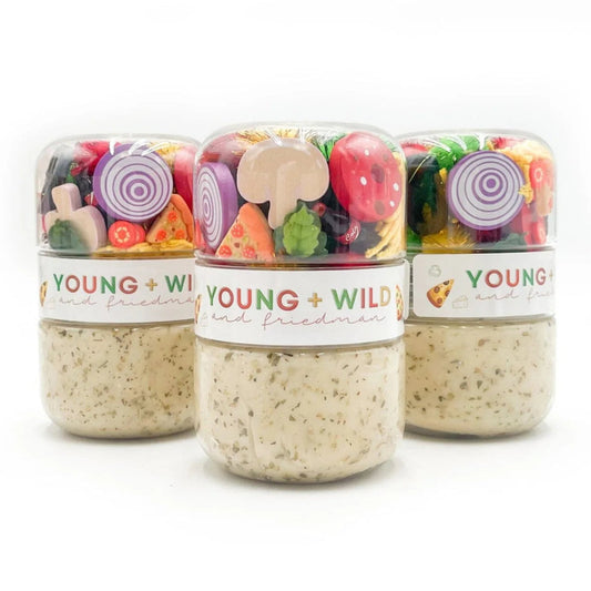 Three jars of 'Young & Wild' gummy bears on a white background