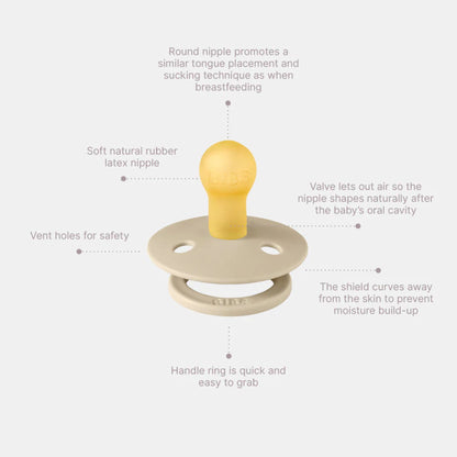 Baby pacifier with text detailing its features on a white background