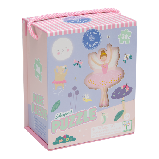 Puzzle box with a ballerina design on a white background