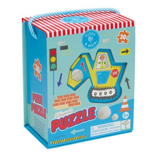Children's puzzle packaging with a construction vehicle design on a white background