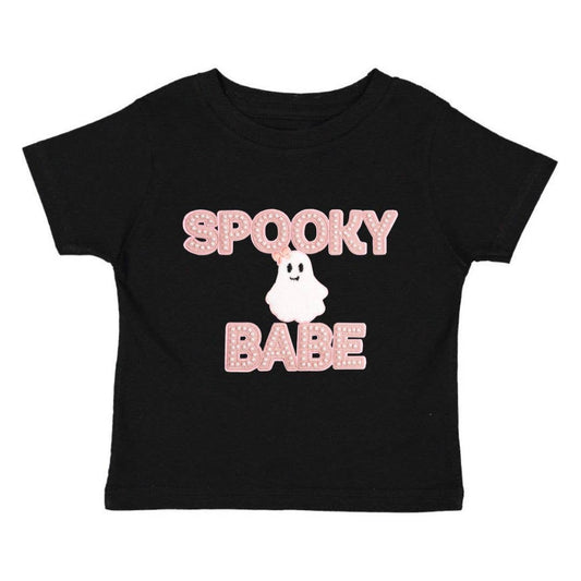 black shirt with spooky babe letters on the front in light pink and a white ghost
